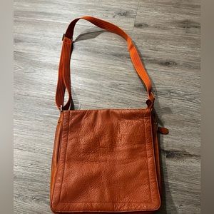 Orange cross body Arera bag